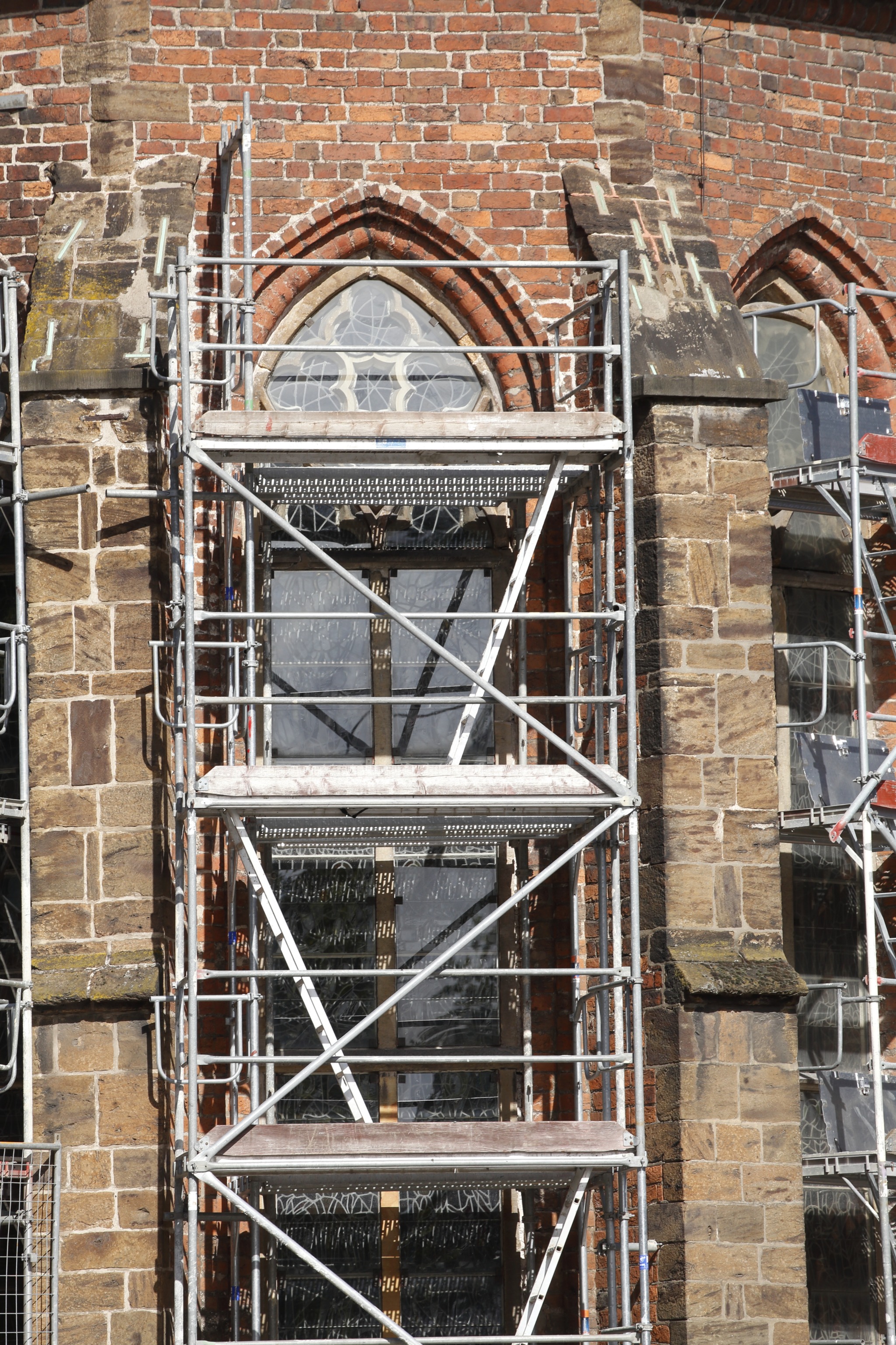 Scaffolding against a listed building