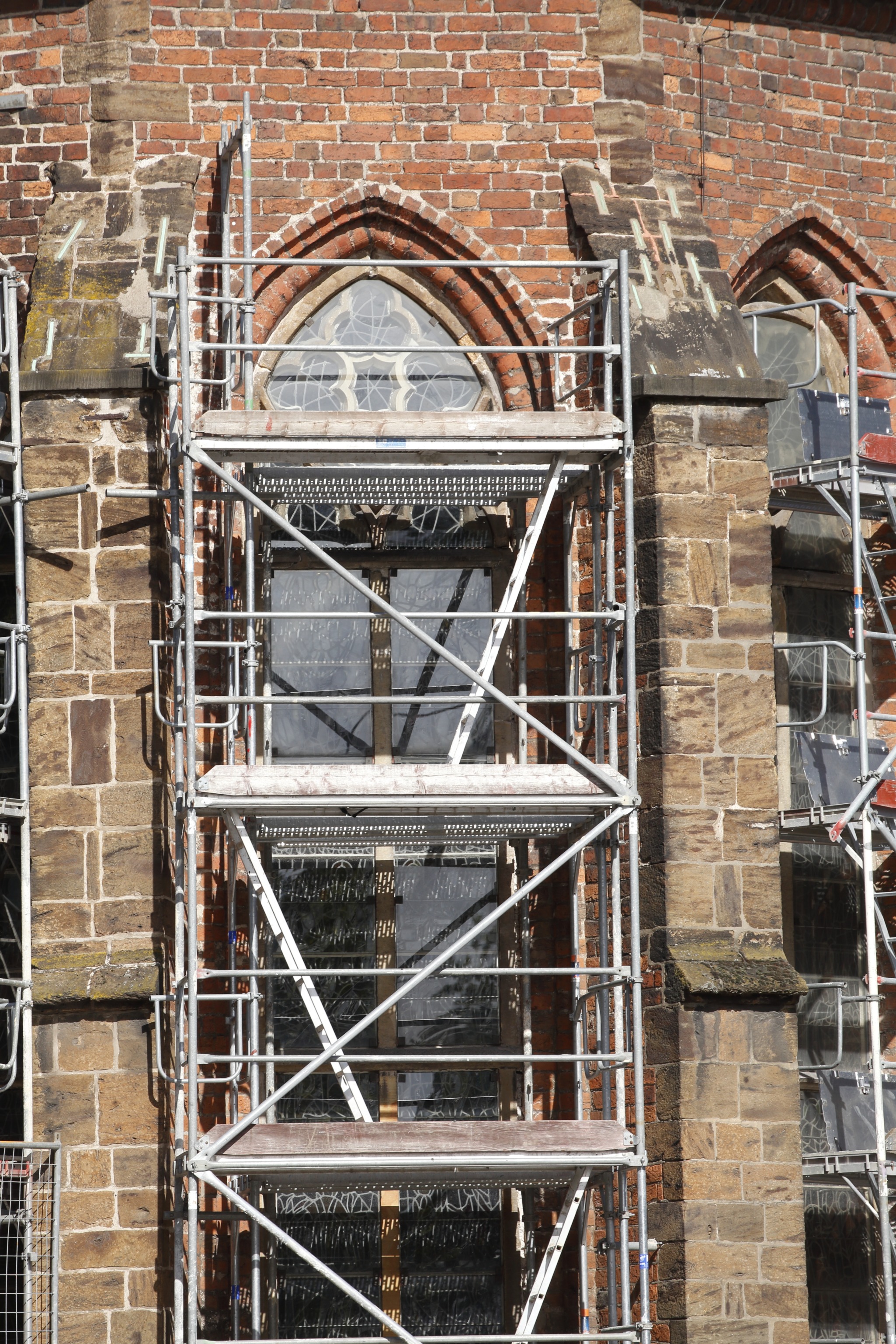 Scaffolding against a listed building