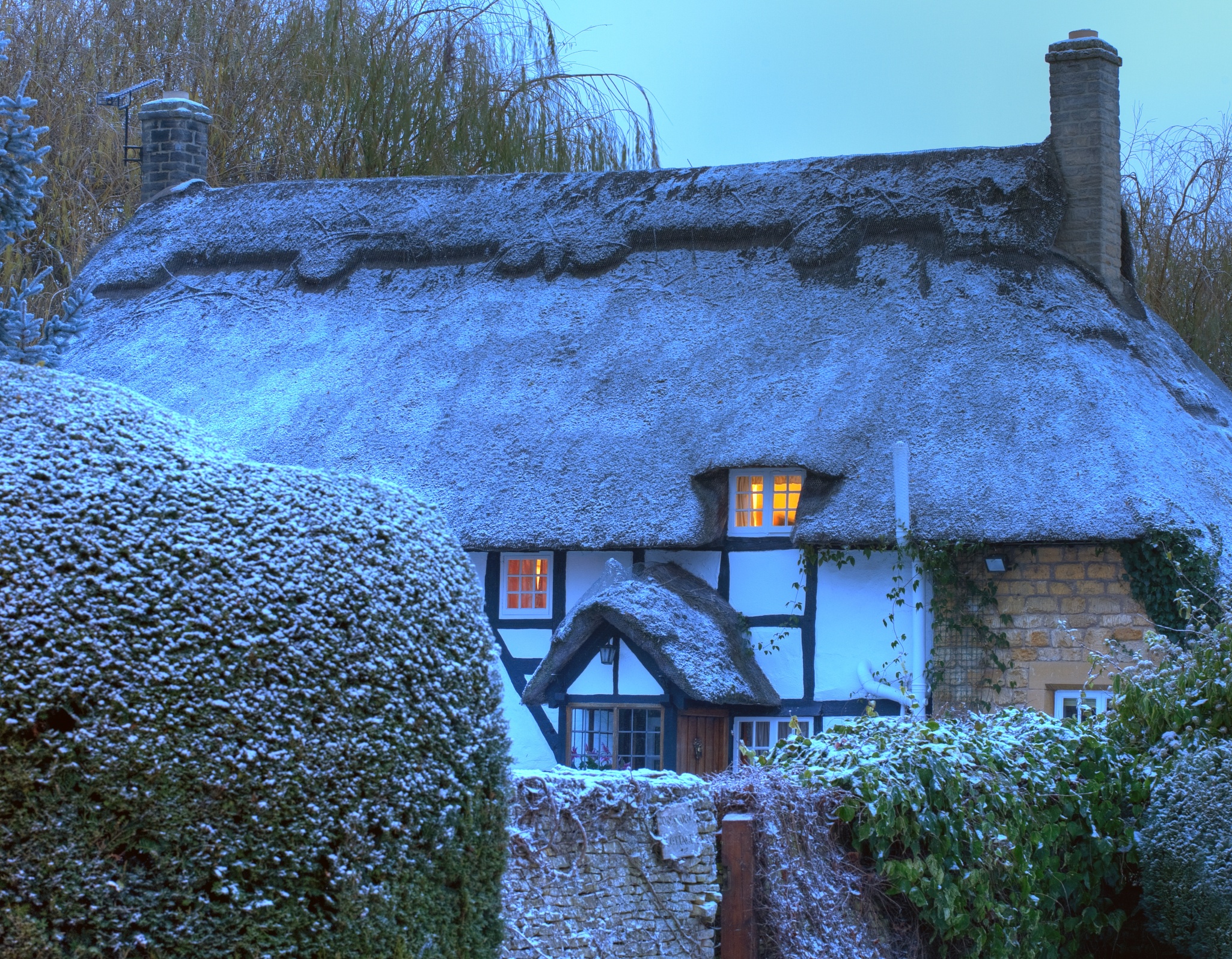 Thatched cottage in winter